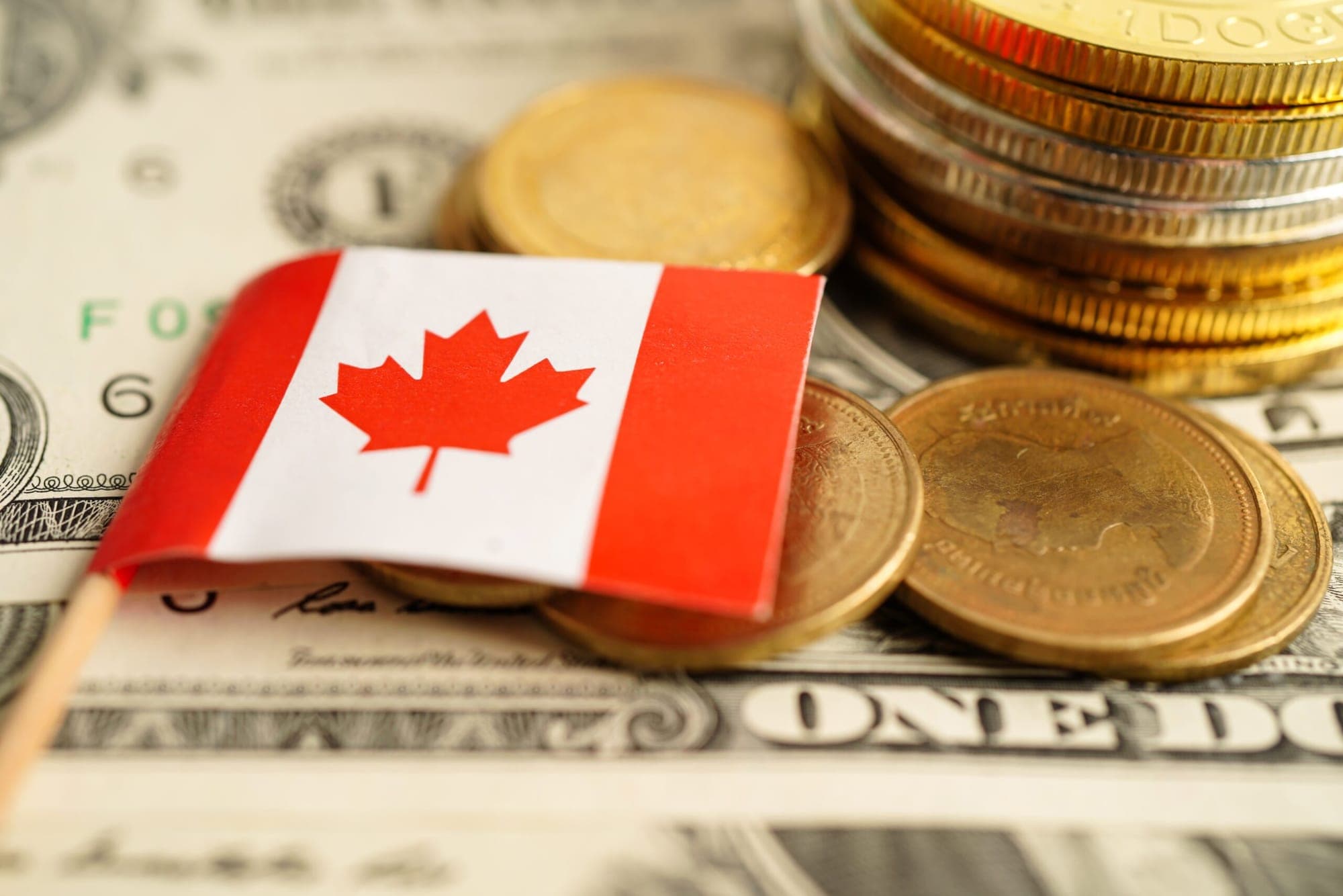 Canadian Dollar Plummets represented in a picture.