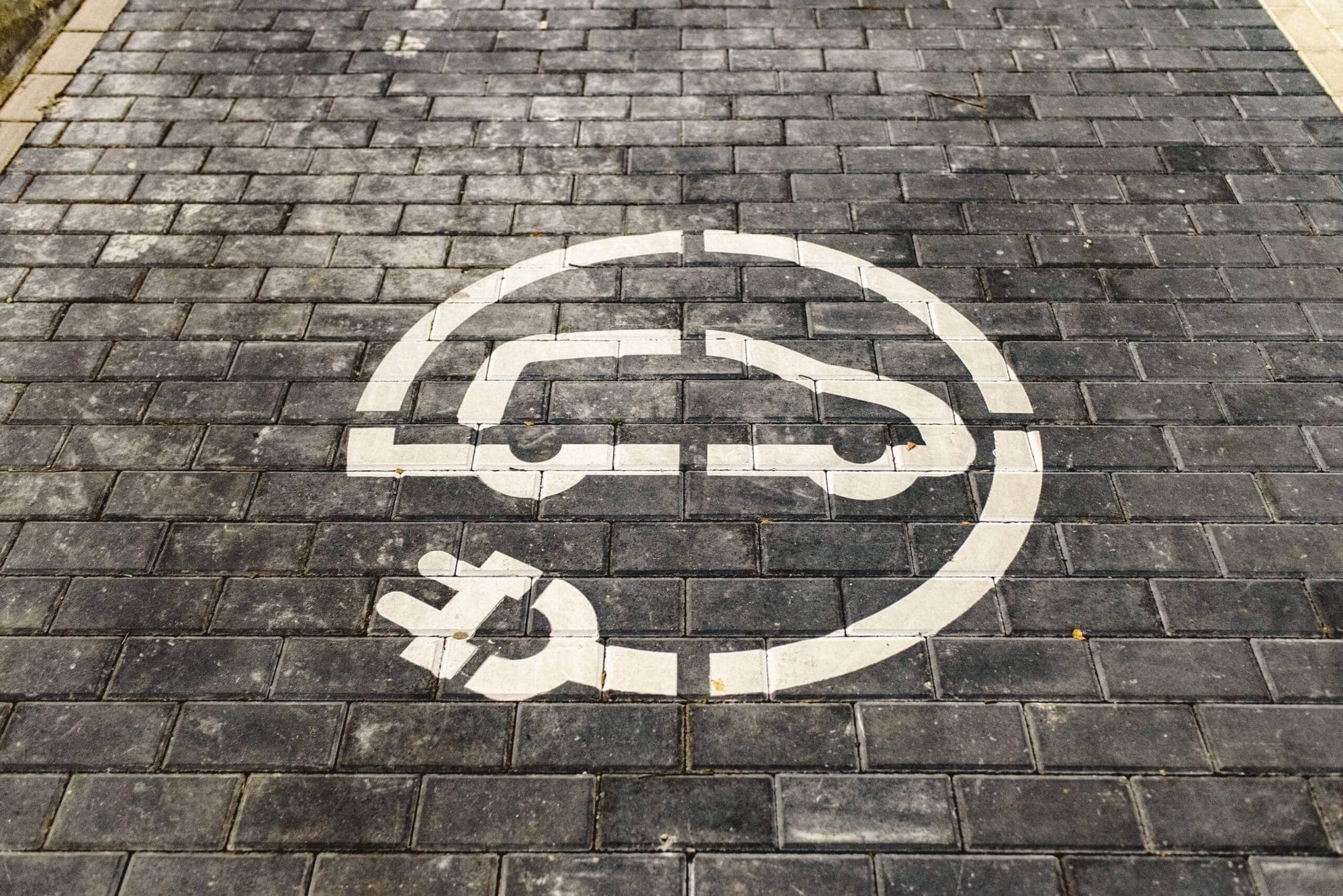 Europe's Struggle with Electric Car Adoption represented in an image.