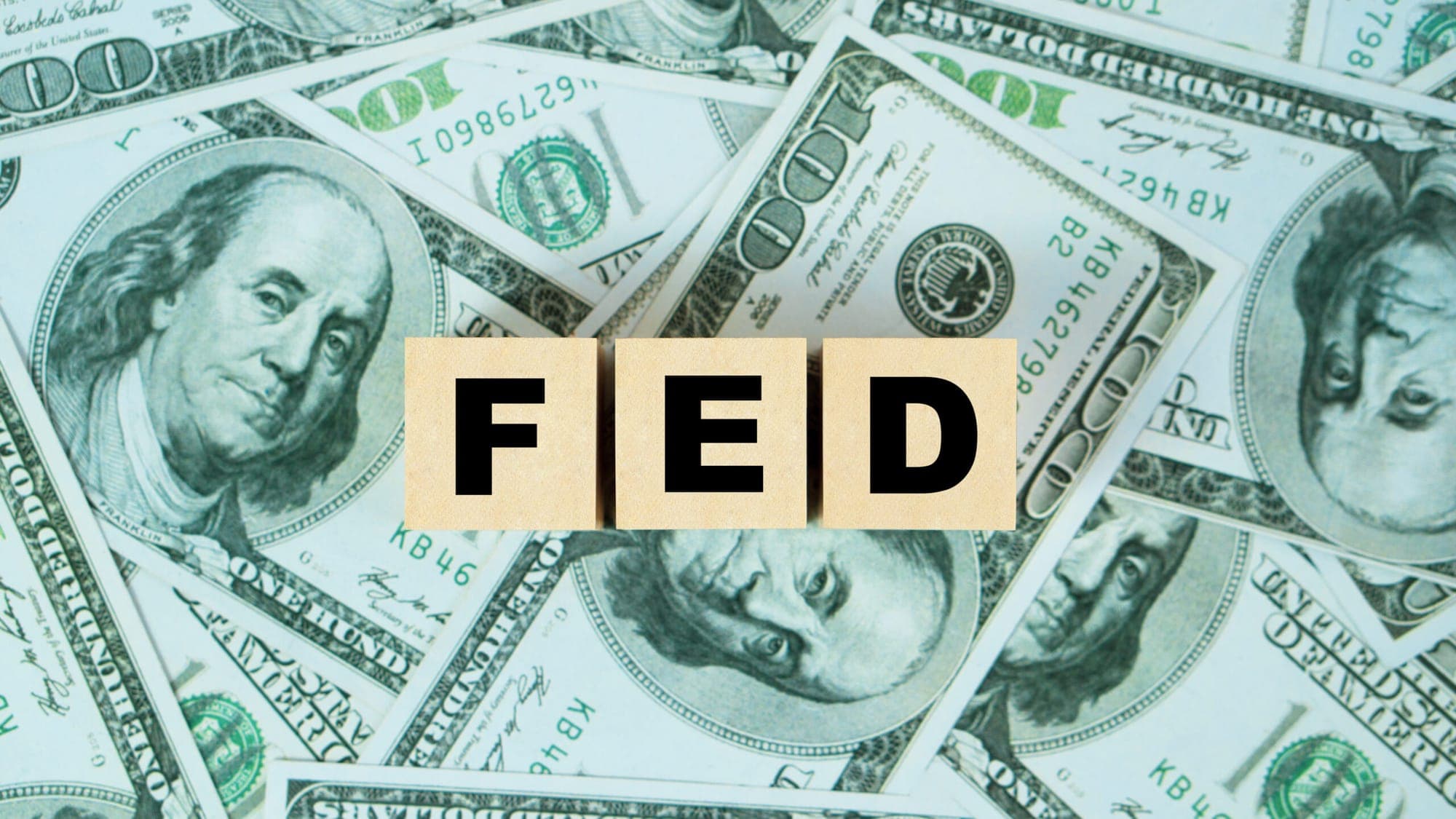 Fed Pauses for Now but Signals Higher Peak Rate represented in a picture.