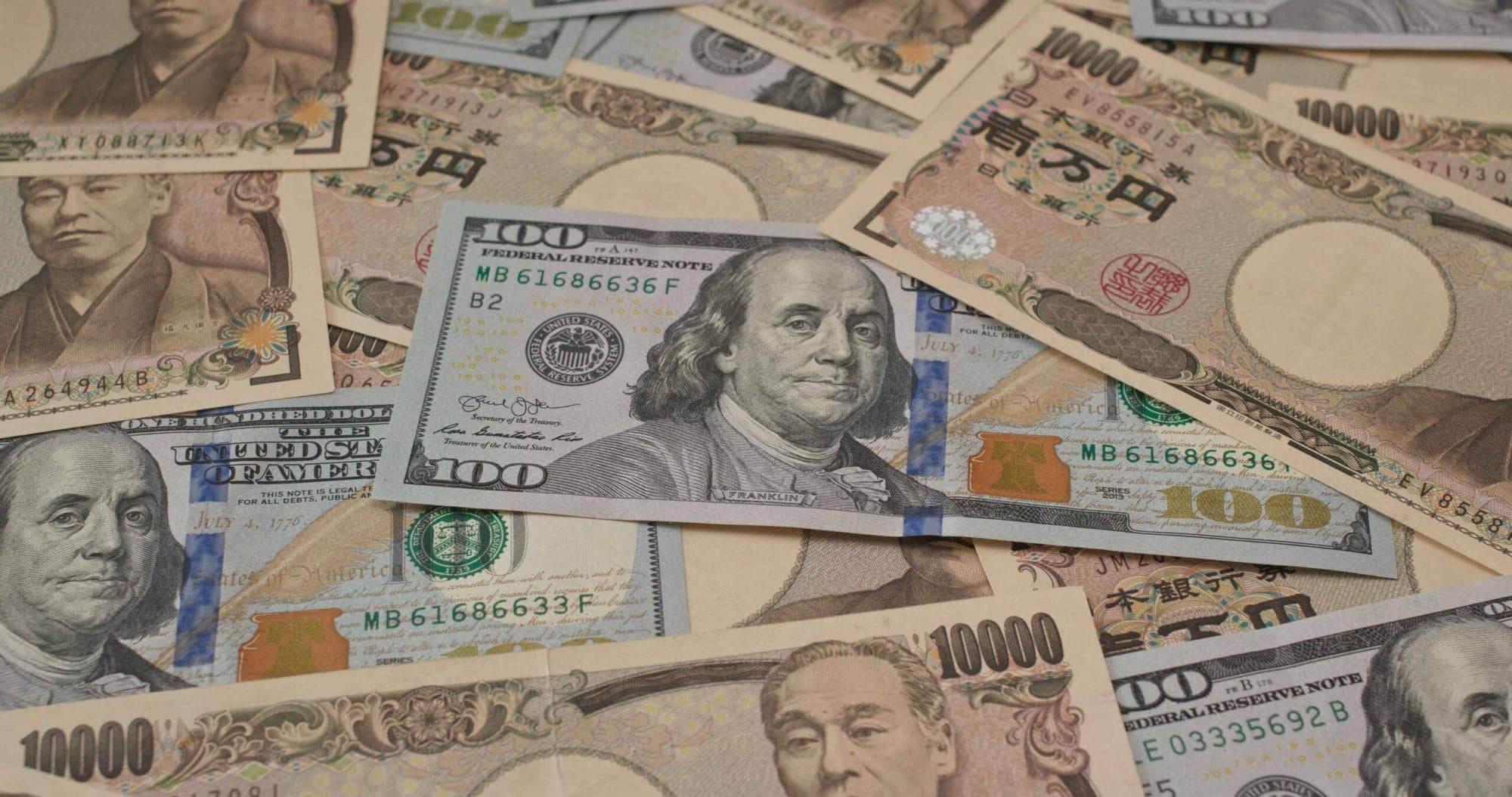 USD/JPY represented in an image.