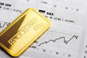 Gold prices surged as the US Dollar weakened, represented in an image.